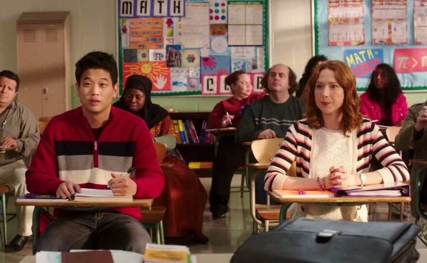 Dong (Ki Hong Lee) and Kimmy (Ellie Kemper), right after they meet for the very first time.