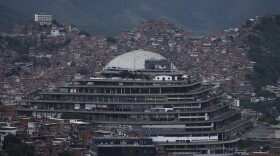 Venezuela's National Intelligence Service headquarters, known as El Helicoide, stands in front of La Cota 905 neighborhood in Caracas, Venezuela, Sept. 12, 2022.