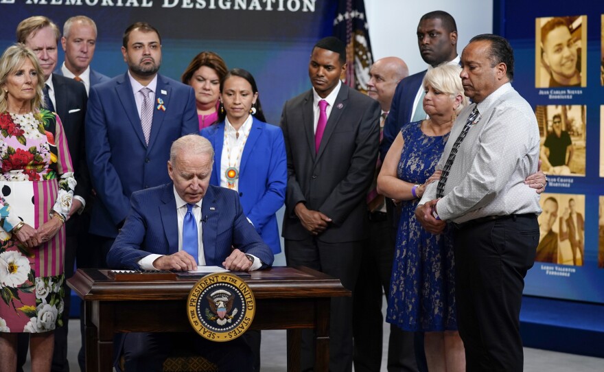 President Biden pauses while speaking before signing the National Pulse Memorial bill into law.