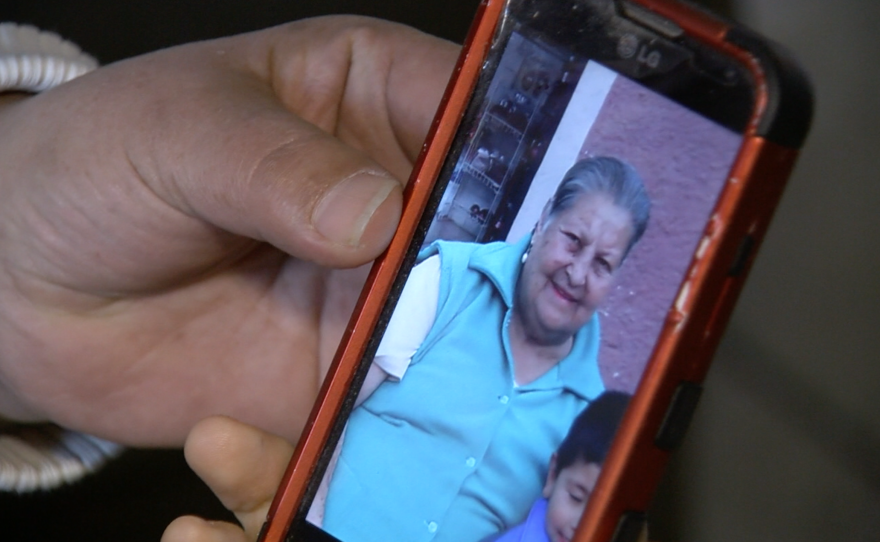 Teresa Gomez shows KPBS a picture of her mother, Carmen, Jan. 20, 2017.