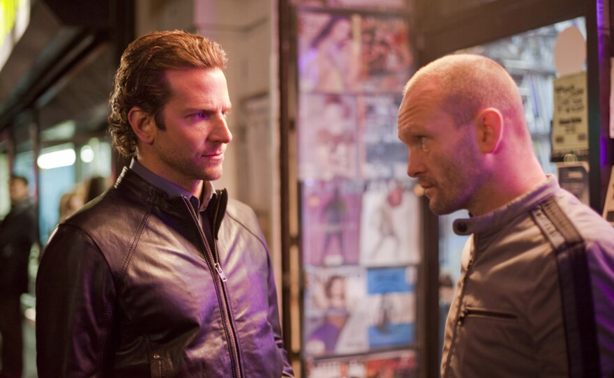 Bradley Cooper with Andrew Howard in "Limitless."