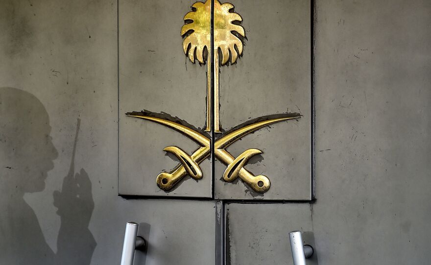 A security officer's shadow marked the door of Saudi Arabia's consulate in Istanbul. The top Saudi prosecutor now says journalist and U.S. resident Jamal Khashoggi was murdered at the diplomatic facility.