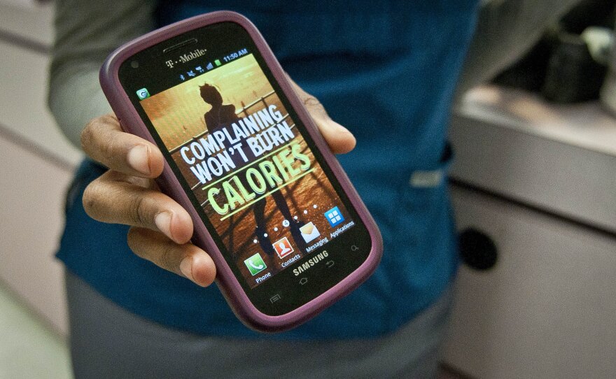 Nyuma Harrison uses her phone and social networking sites to track progress and motivate the team.