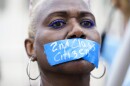 An abortion-rights activist wears a tape reading "2nd Class Citizen" on their mouth as they protest outside the Supreme Court in Washington, Friday, June 24, 2022. The Supreme Court has ended constitutional protections for abortion that had been in place nearly 50 years in a decision by its conservative majority to overturn Roe v. Wade.
