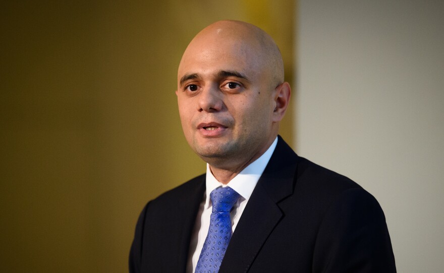 U.K. Health Secretary Sajid Javid, pictured in 2015, tested positive for coronavirus on Saturday. The nation is poised to lift sweeping restrictions, despite a spike in cases led by the delta variant.