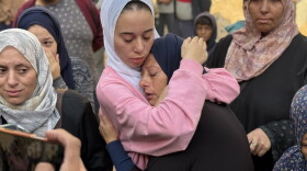 A Palestinian mother mourns her son, who was killed in an Israeli airstrike just over a month into the ceasefire, at Al-Shifa Hospital, in Gaza City, on Nov. 20, 2025.