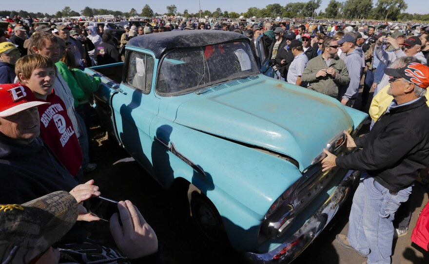 This 1958 Chevrolet Cameo pickup truck with 1.3 miles and a three-speed transmission sold for $140,000 at Saturday's auction of vehicles stockpiled for decades by car dealership owner Ray Lambrecht.