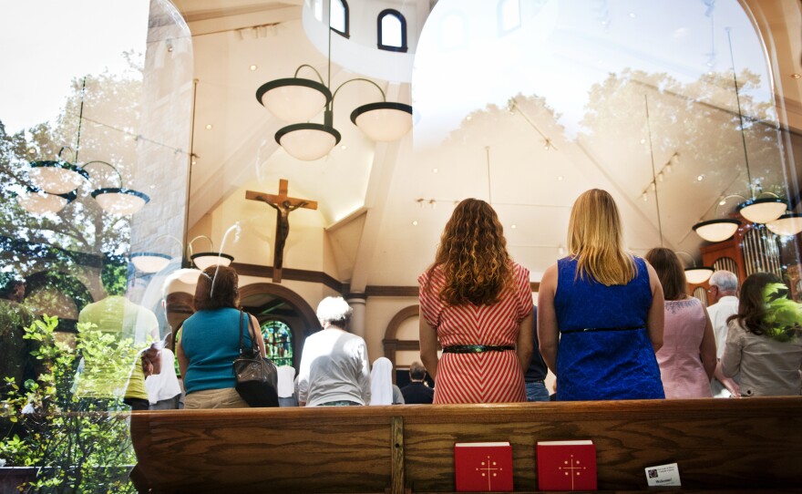 Fabiola Morales and Kelly Costello attend Catholic Mass every Sunday at their local church in Potomac, Md. The women say their faith has kept them strong through the uncertainty.