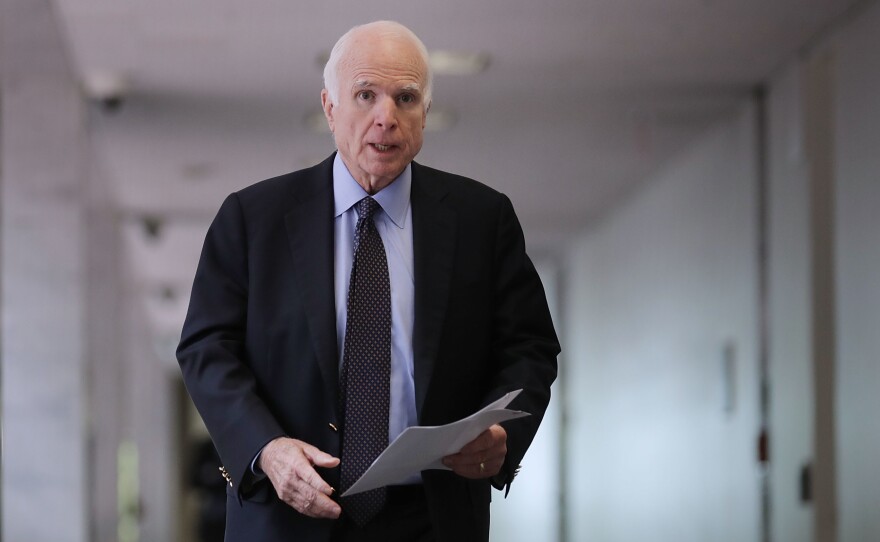 Senate Intelligence Committee member Sen. John McCain, R-Ariz., heads into a closed-door committee meeting with Director of National Intelligence Dan Coats on June 15 in Washington, D.C.