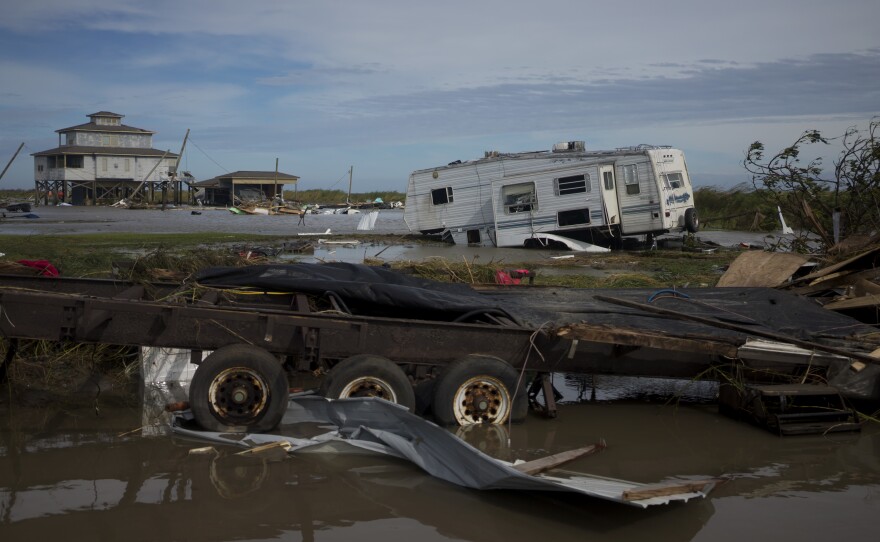 Scattered debris and a damaged trailer in Holly Beach, La., in the aftermath of Hurricane Laura.