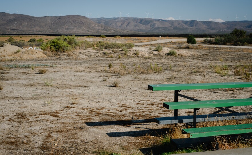 An aging set of bleachers sits next to the dirt field where parents hope to build a youth soccer field in Jacumba Hot Springs, California, in East County on Sept. 26, 2025.