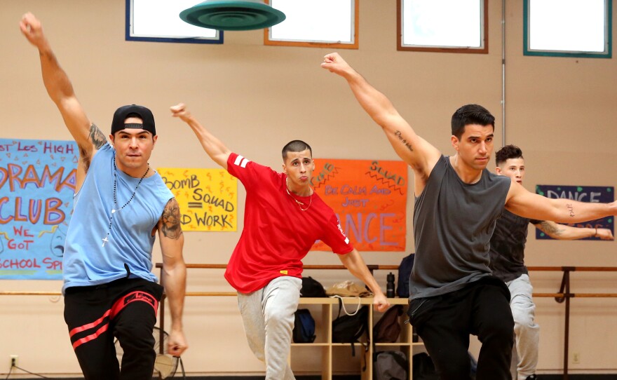 The boys of East Los High's dance team practice their moves.