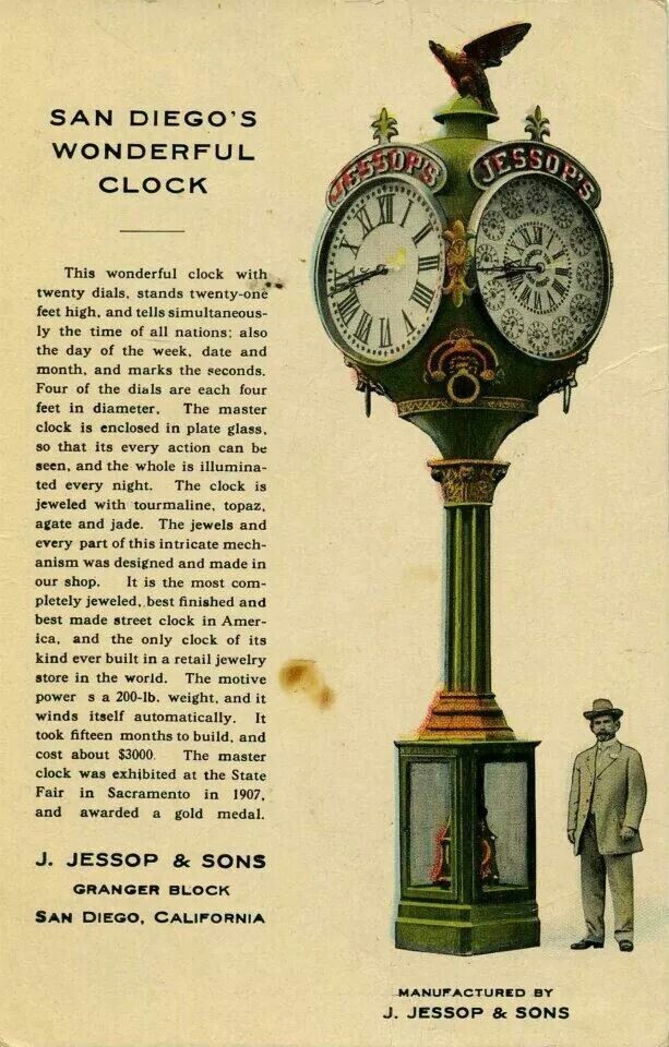 A flyer is shown in this historic photo advertising the Jessop's Clock. A man is shown standing next to the clock to demonstrate the clock's 22-foot height.