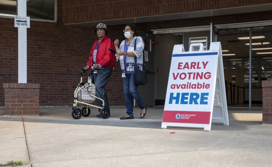 Fulton County voters leave an early voting site located inside C.T. Martin Natatorium and Recreation Center in Atlanta on May 18.