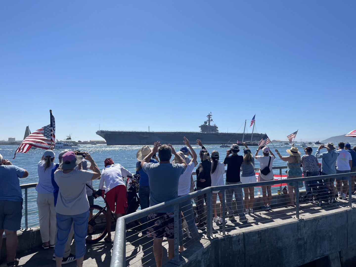 Families gather to welcome the USS Lincoln on Oct. 8, 2026.