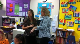 Kendall Sczempka , left, discusses her classroom with Poway Unified Teacher Consultant Michelle Manos, Oct. 30, 2012.