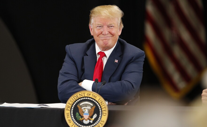 President Trump speaks at a roundtable on the economy and tax reform in April. Heading into the 2020 campaign, Democratic candidates are trying to find arguments against him on the economy, which is doing well according to top-line indicators.
