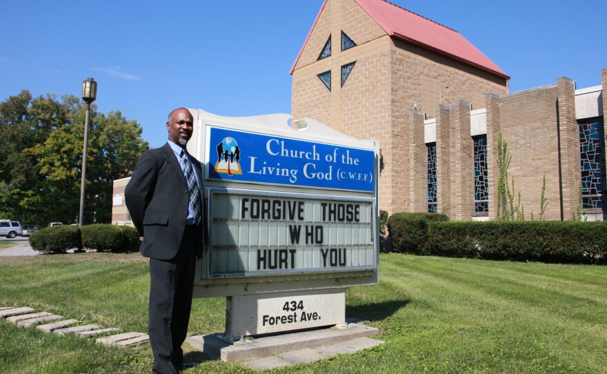 Ennis Tait, the pastor at Cincinnati's Church of the Living God, worries that as an African-American, he wouldn't have a place in Donald Trump's America.