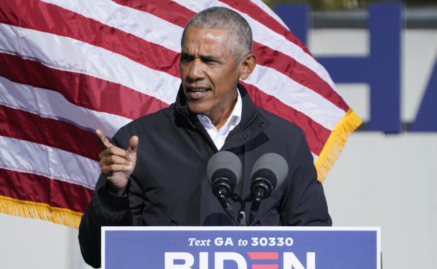 Former President Barack Obama speaks at a rally as he campaigns for Democratic presidential candidate former Vice President Joe Biden, Monday, Nov. 2, 2020, at Turner Field in Atlanta. (AP Photo/Brynn Anderson)
