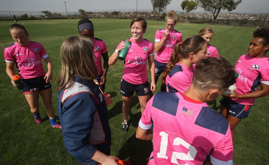 The team takes a water break.