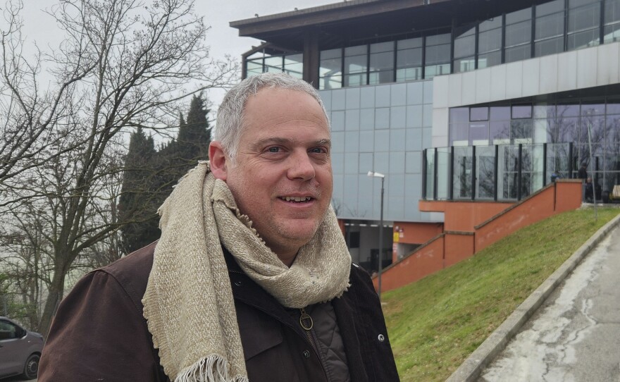 Matteo Diotalevi stands outside the modern dining hall at the center of San Patrignano, where he has worked for fifteen years. Many of the 850 people who live in the addiction treatment community gather here daily for shared meals. "We help people find another chance," Diotalevi said.