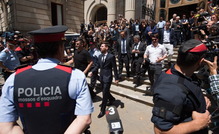 Lionel Messi will likely have his jail sentence suspended, under Spanish law. He's seen here leaving a courthouse in Barcelona last month, followed by his father, Jorge Horacio Messi, and his brother Rodrigo Messi.