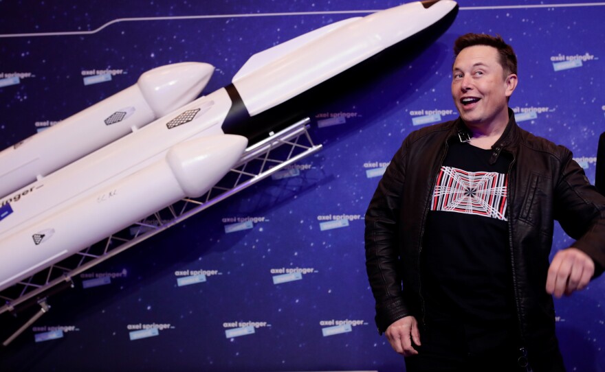 Tesla CEO Elon Musk strikes a pose at a December 2020 awards ceremony in Germany.