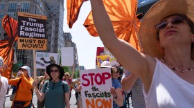 Demonstrators march to the White House during a May Day protest in Washington, D.C., on May 1, 2025.