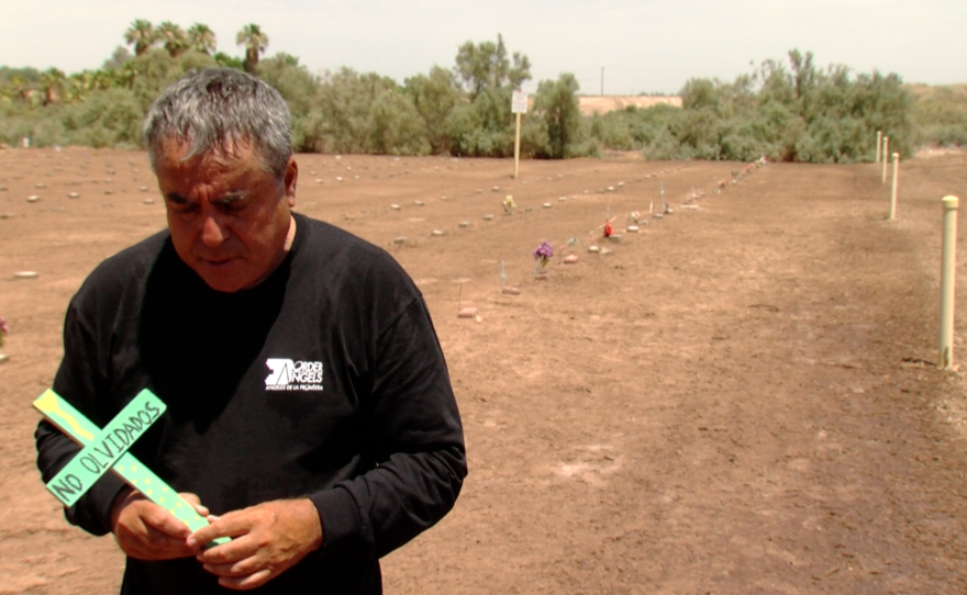 Enrique Morones, founder of Border Angels, stands in Terrace Park Cemetery, June 27, 2016. 