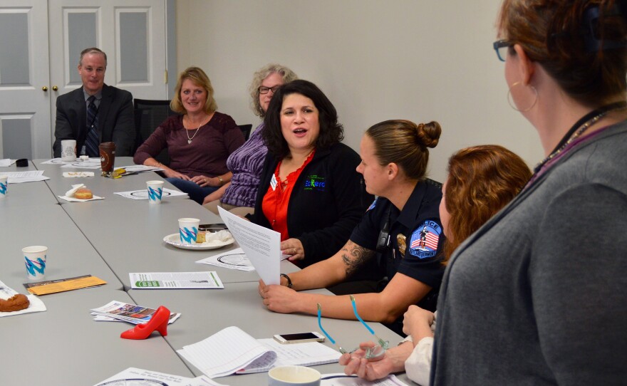 Jennifer Stout, center, is the state director of Eckerd, a nonprofit that provides family coaching services in Rutland. She regularly attends community coffee klatsches at the Rutland Police Department. Stout and other participants say these types of meetings have helped agencies share information and strategies to tackle drug abuse, crime, mental health problems and domestic violence.