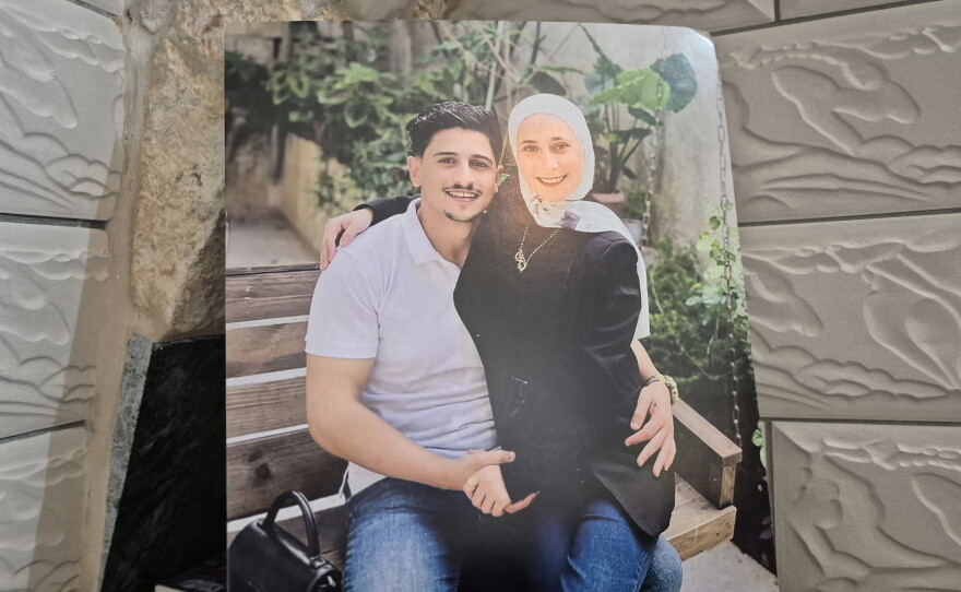 Nayef Samaro, 25, hold his wife Raghad al-Shami, 21.