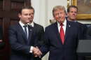 President Donald Trump shakes hands with Commodity Futures Trading Commission (CFTC) Chairman Michael Selig during a meeting with technology leaders in the Roosevelt Room of the White House, Wednesday, Aug. 19, 2026, in Washington.
