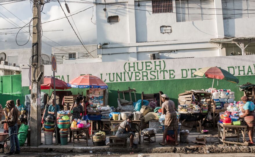 A busy market near the State Hospital in downtown Port-au-Prince. Despite a halt to air travel and other lockdown measures, Port-au-Prince looks as busy as ever, say observers.