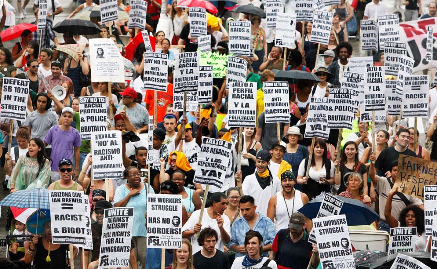 Protesters rallied against Arizona's new immigration law earlier this month in Boston, where Arizona Gov. Jan Brewer was attending National Governors Association sessions.