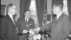 NASA's new telescope bears the name of James Webb (center), an influential figure who was appointed by President John F. Kennedy to lead the space agency during the '60s. But some astronomers say discrimination against gay and lesbian government employees during his tenure should preclude him from having a telescope named in his honor.