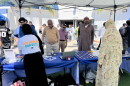 People gather at voter registration tables outside of Islamic Center of San Diego, Sept. 18, 2026.