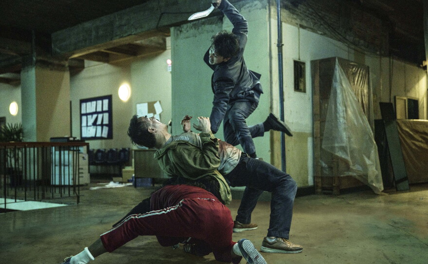 Navin (Joe Taslim) stuck between a rock and a hard place of Tak (Yayan Ruhian) and Pak (Joey Iwanaga) in Kenji Tanigaki's "The Furious." (2025)