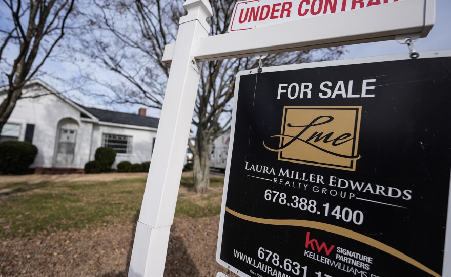 A home for sale sign on Tuesday, Jan. 16, 2024, in Kennesaw, Ga. On Friday, the National Association of Realtors reported that 2023 saw the smallest number of home sales in nearly 30 years.