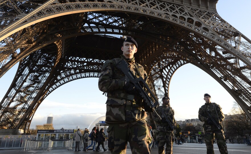 French soldiers patrol in front of the Eiffel Tower on Jan. 8, 2015, the day after a deadly attack on the French satirical newspaper Charlie Hebdo. With bombings Tuesday in Brussels, Europe has now been hit by three major terrorist attacks in just over a year.