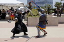 The clash of armor echoed across the West Mezzanine Terrace of the San Diego Convention Center during the Society for Creative Anachronism's live combat demonstration on July 24, 2026.