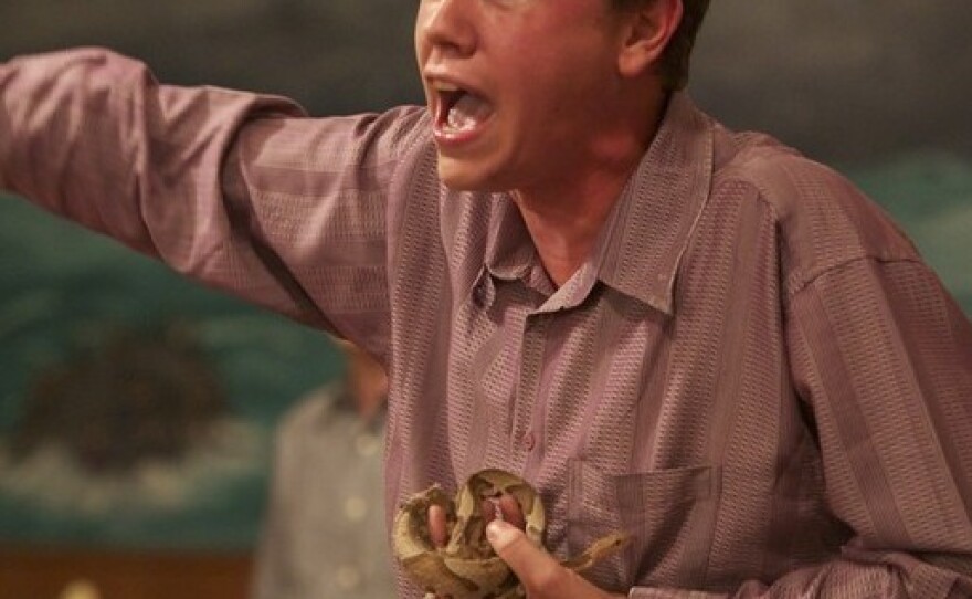 Andrew Hamblin, pastor of Tabernacle Church of God in LaFollette, Tenn., holds a serpent during a church service. "The feeling to take up serpents," he says, "is unexplainable."