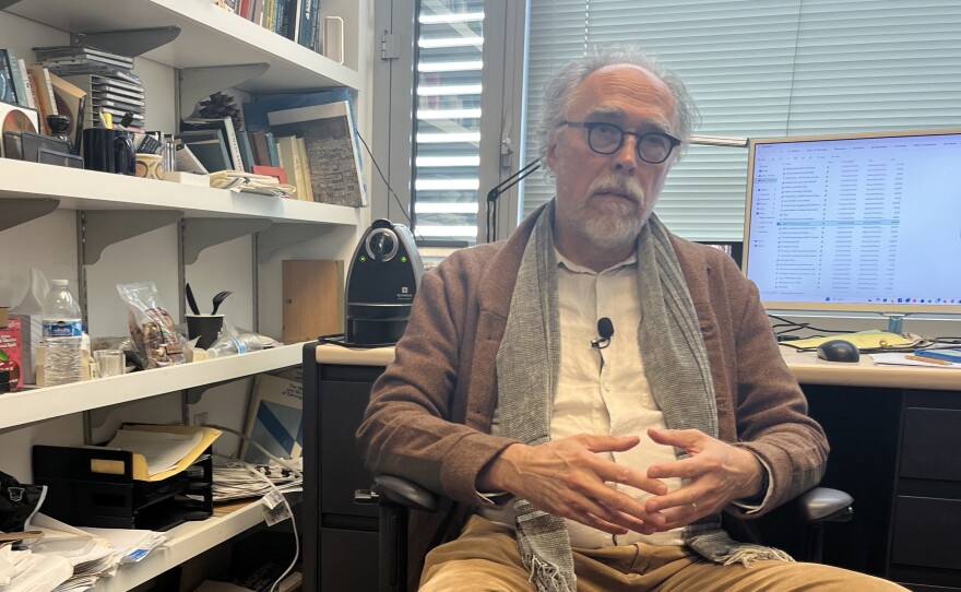 UC San Diego professor Akos Rona-Tas sits in his office on campus on Nov. 24, 2025.