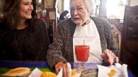 AnnaBelle Bowers, 87, has lunch with granddaughter Kelley Hawkins in Harrisburg, Pa. Kelley and her sister-in-law, LaDonna Martin, jointly care for AnaBelle.