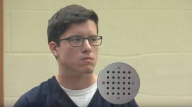 19-year-old John T. Earnest stands for his arraignment hearing in San Diego, April 30, 2019
