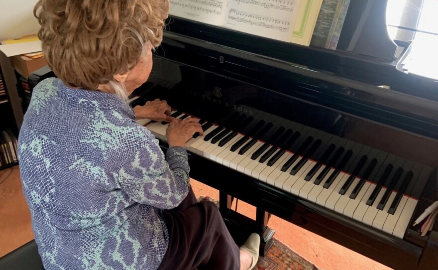 Maze plays her Steinway piano, one of two pianos in her apartment.