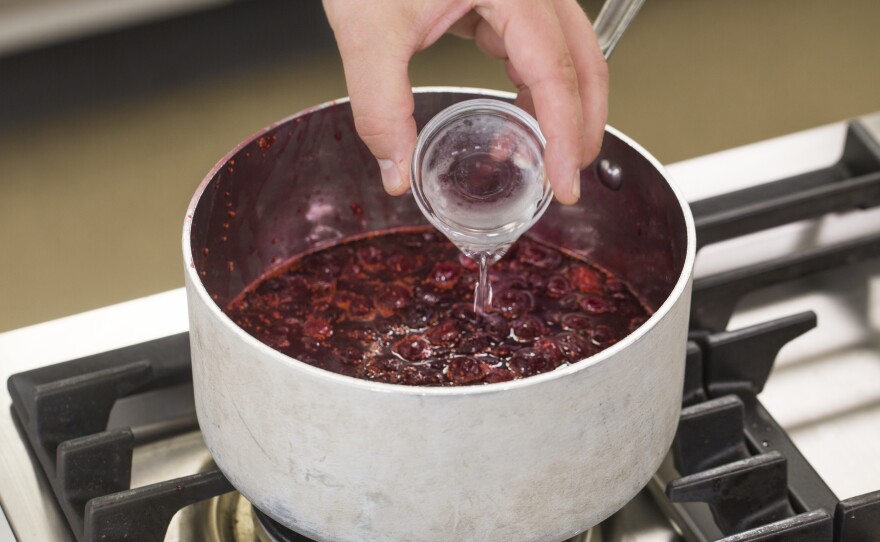 This cranberry sauce recipe calls for orange zest as well as orange liqueur like Grand Marnier.