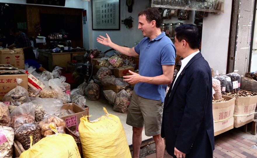 Host Phil Rosenthal tours Medicine Street in Hong Kong.