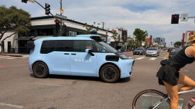 A Waymo driverless car crosses the intersection of 30th and University Avenues in North Park on Aug. 20, 2026.