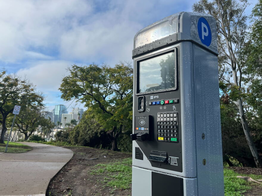 A new parking meter in Balboa Park stands beside a cement path on Jan. 7, 2026.