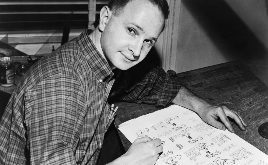 Jules Feiffer at work on proof sheets from his first book, Sick, Sick, Sick in New York in 1958.